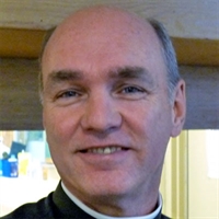 Rev Russell Arnett